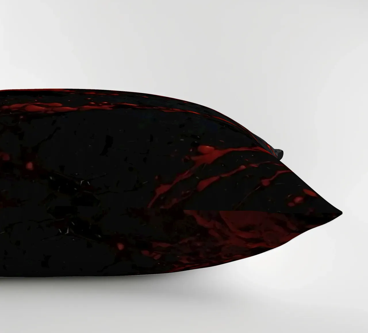 Schizzi astratti di vernice rossa su una superficie nera cuscino da DesignDoodle