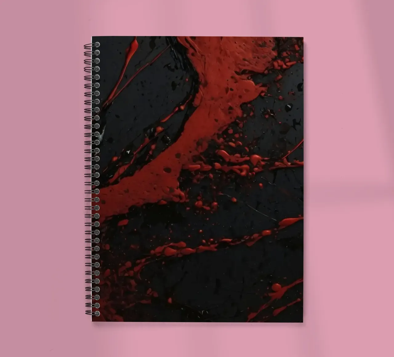 Abstract red paint splatters on a black surface spiral notebook by DesignDoodle
