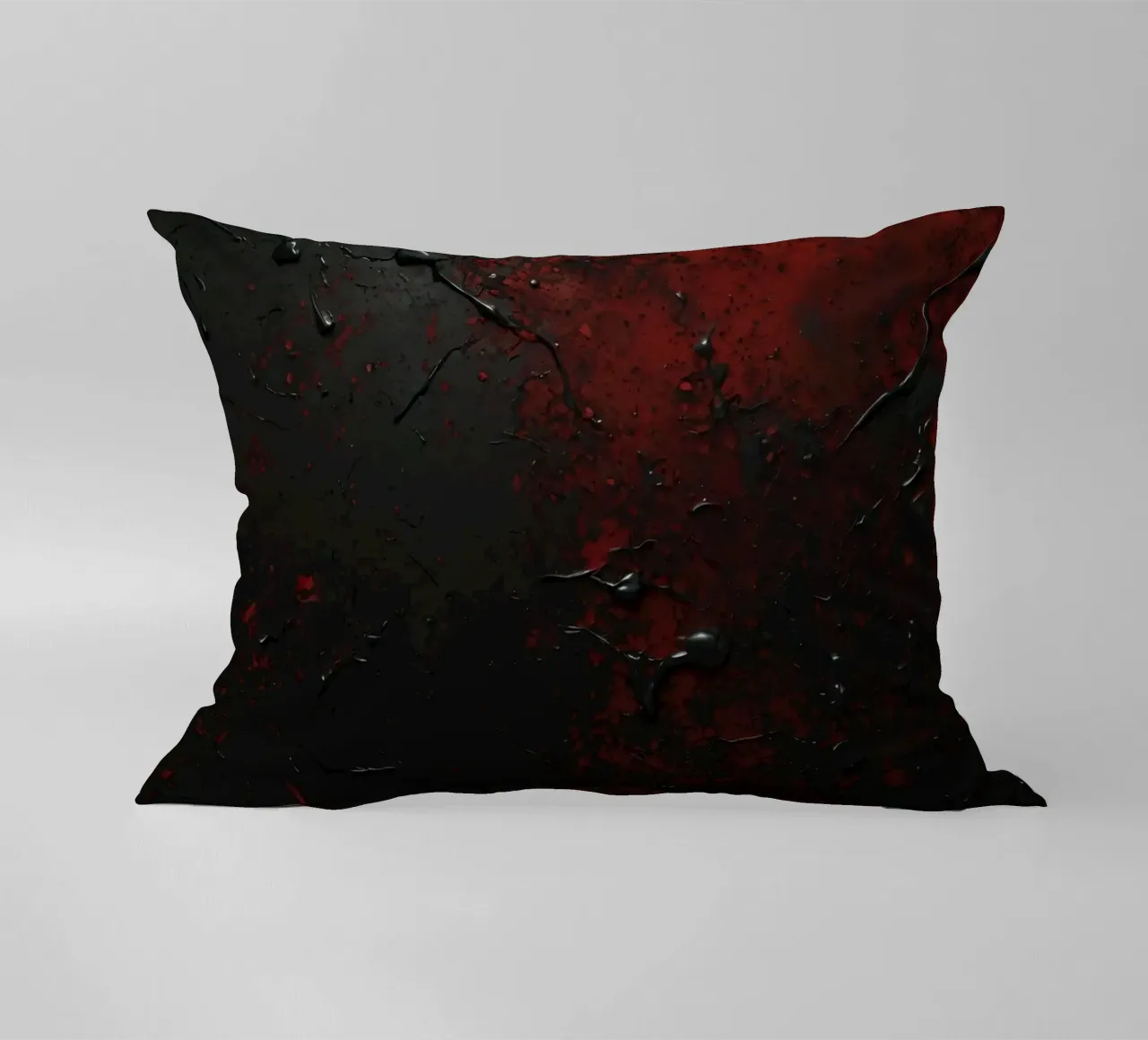 Texture astratta con spruzzi di vernice nera e rossa su un cuscino da DesignDoodle