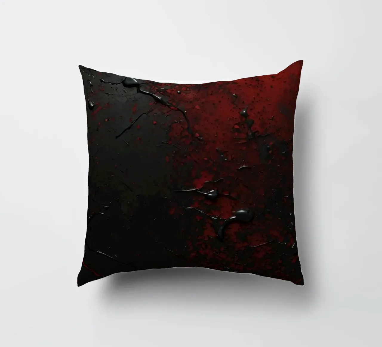 Texture astratta con spruzzi di vernice nera e rossa su un cuscino da DesignDoodle