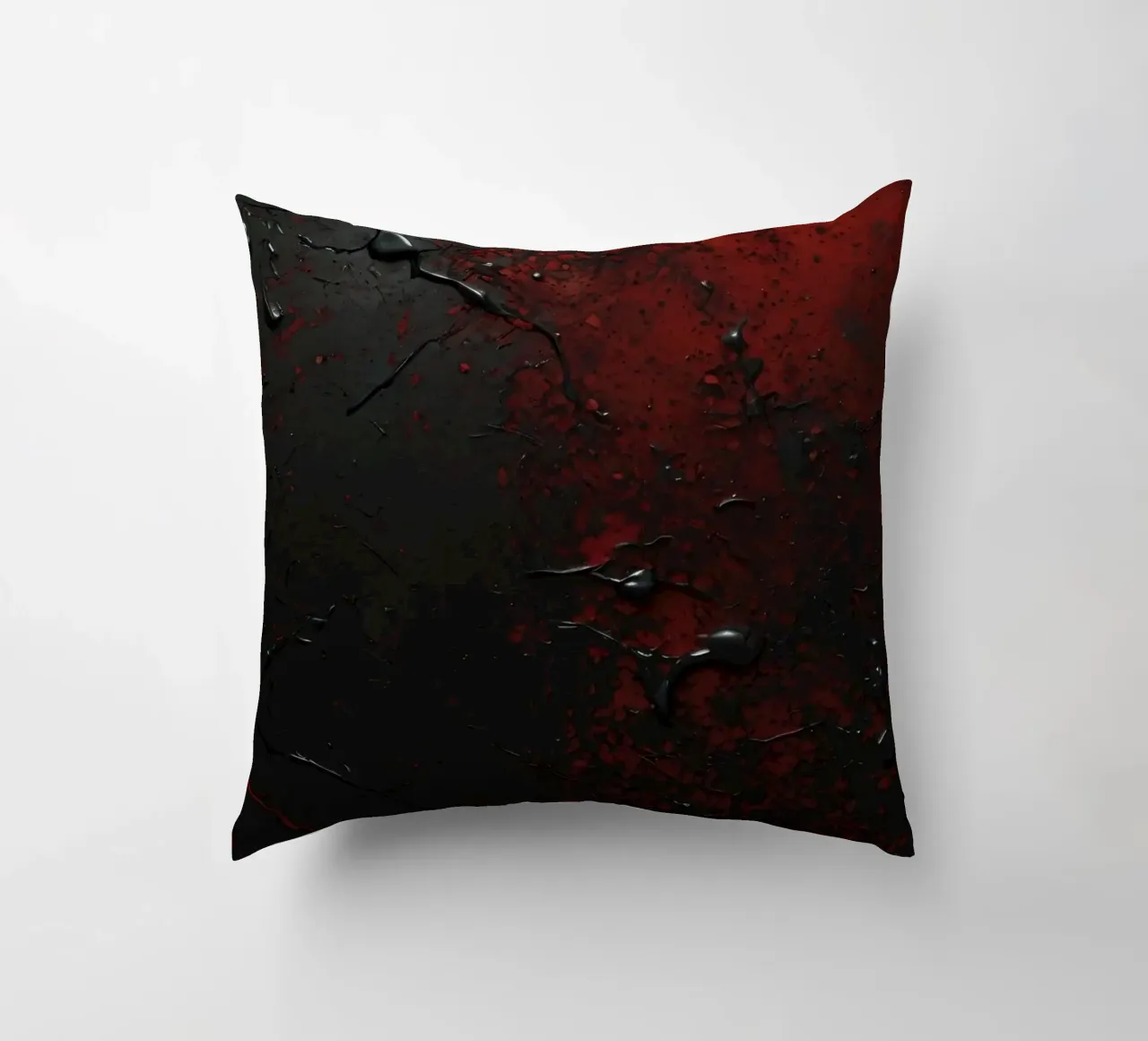 Texture astratta con spruzzi di vernice nera e rossa su un cuscino da DesignDoodle
