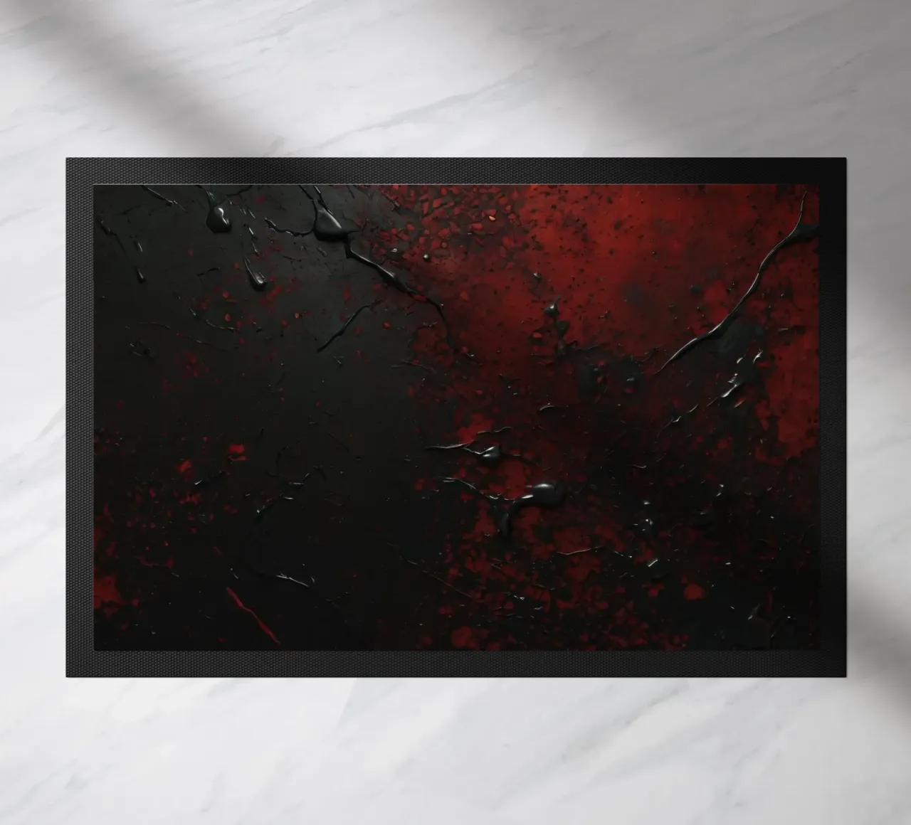 Texture astratta con spruzzi di vernice nera e rossa su un zerbino da DesignDoodle