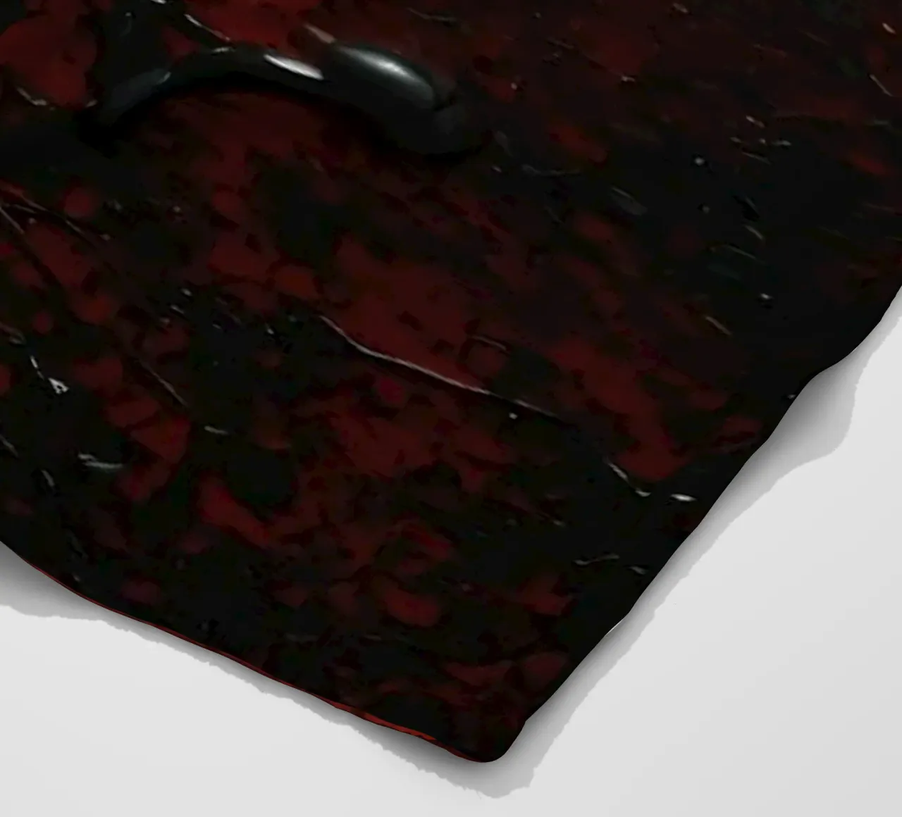 Abstract texture with black and red paint splashes on a dark fleece blanket by DesignDoodle