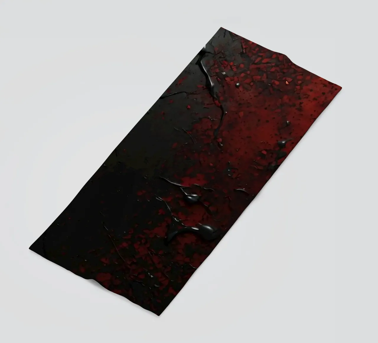 Abstract texture with black and red paint splashes on a dark beach towel by DesignDoodle