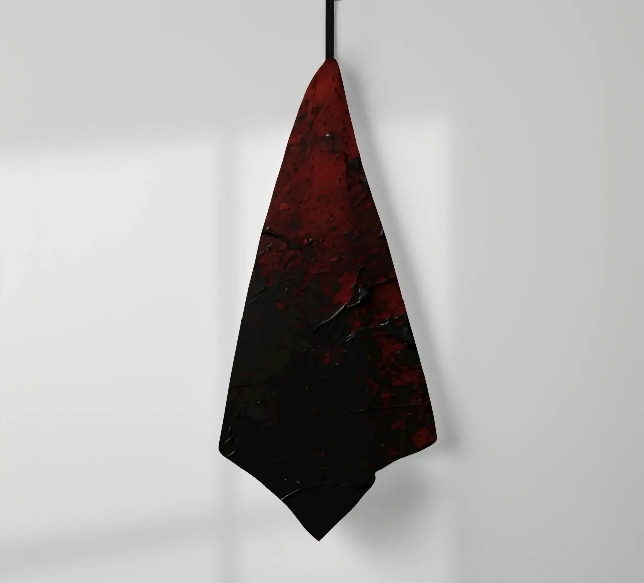 Abstract texture with black and red paint splashes on a dark tea towel by DesignDoodle