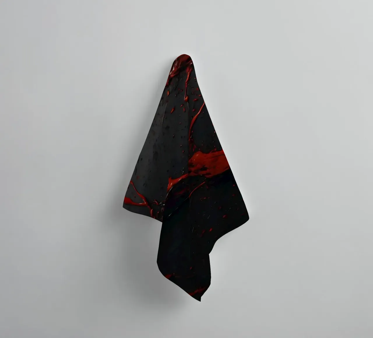 Vivid red paint splatter creates abstract design a dark towel by DesignDoodle