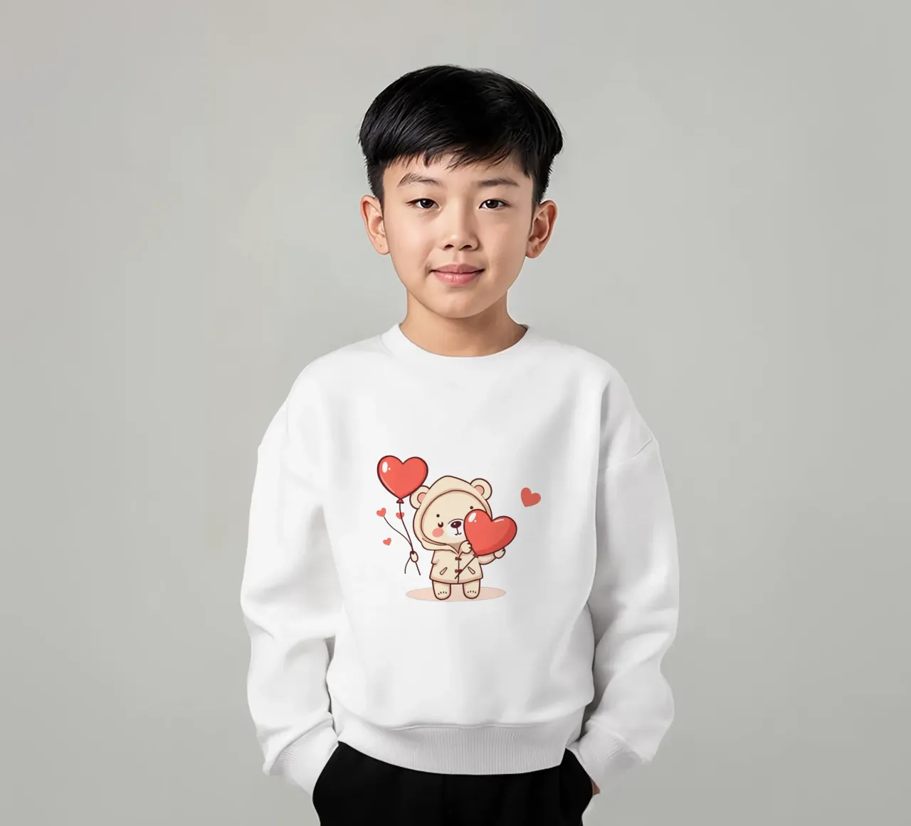 Simpatico orso che tiene in mano un cuore e dei palloncini felpa bambino da DesignDoodle
