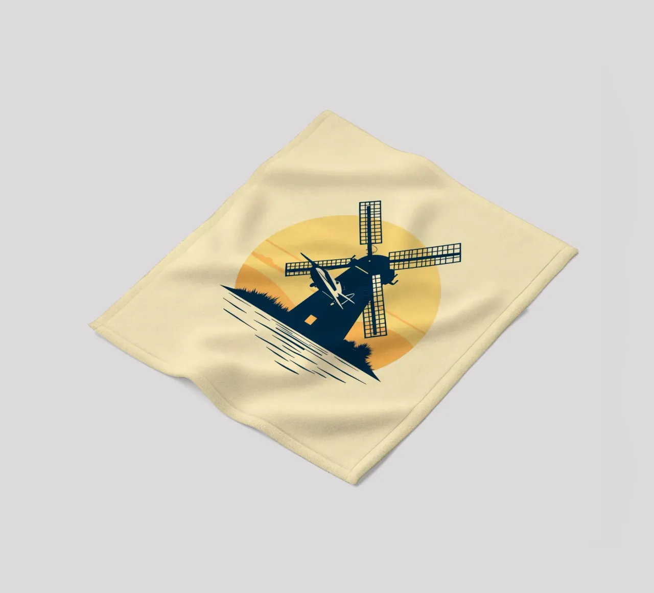 La silhouette di un mulino a vento al tramonto con un aereo in volo coperta in pile da DesignDoodle