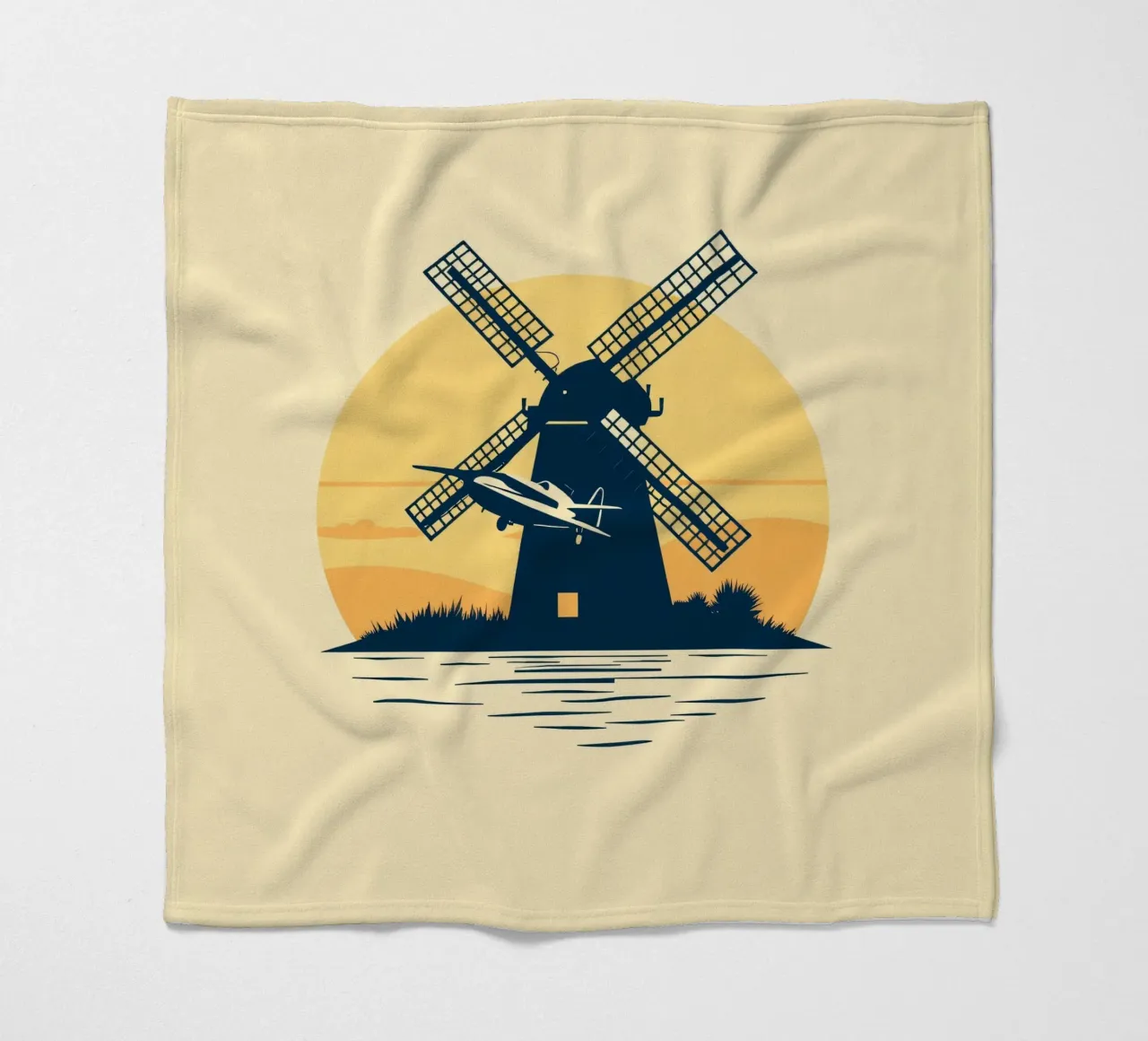 La silhouette di un mulino a vento al tramonto con un aereo in volo coperta in pile da DesignDoodle