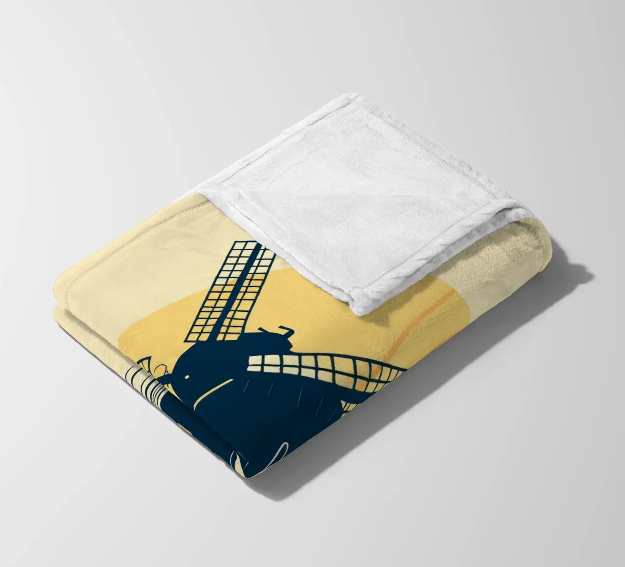 La silhouette di un mulino a vento al tramonto con un aereo in volo coperta in pile da DesignDoodle