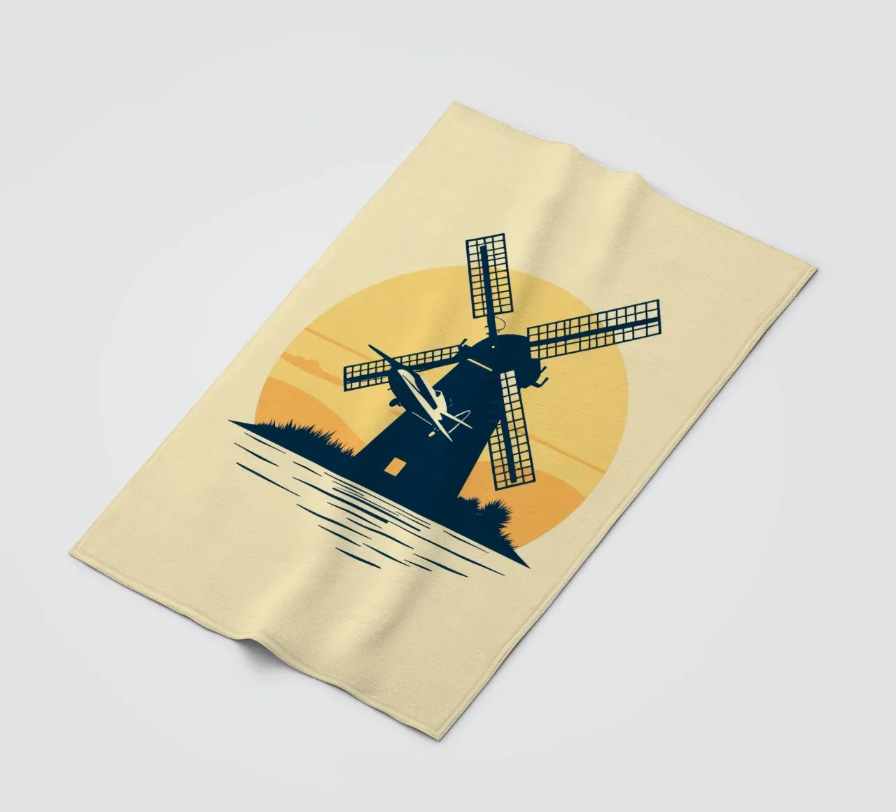 La silhouette di un mulino a vento al tramonto con un aereo in volo coperta in pile da DesignDoodle