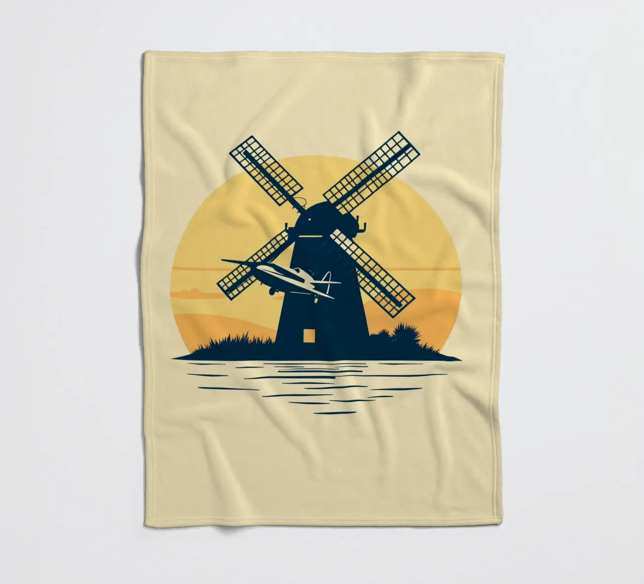 La silhouette di un mulino a vento al tramonto con un aereo in volo coperta in pile da DesignDoodle