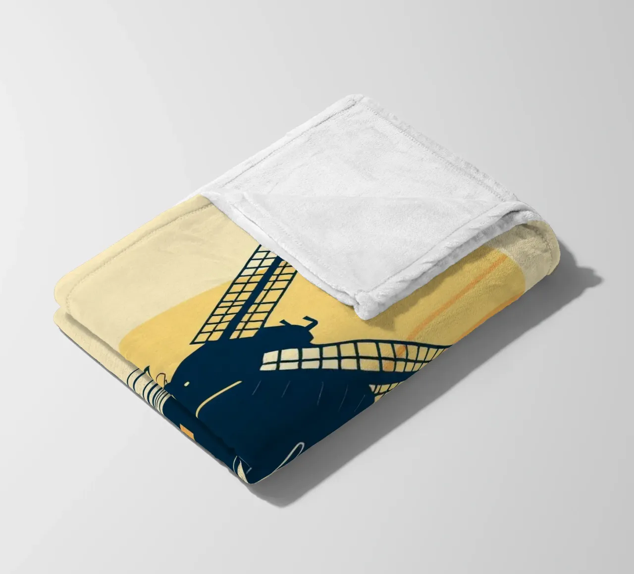 La silhouette di un mulino a vento al tramonto con un aereo in volo coperta in pile da DesignDoodle