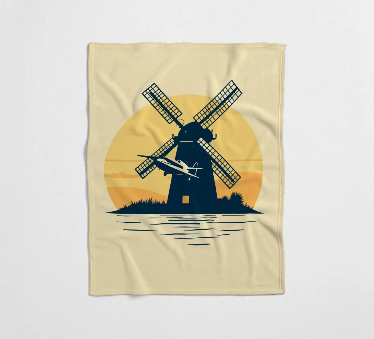 La silhouette di un mulino a vento al tramonto con un aereo in volo coperta in pile da DesignDoodle
