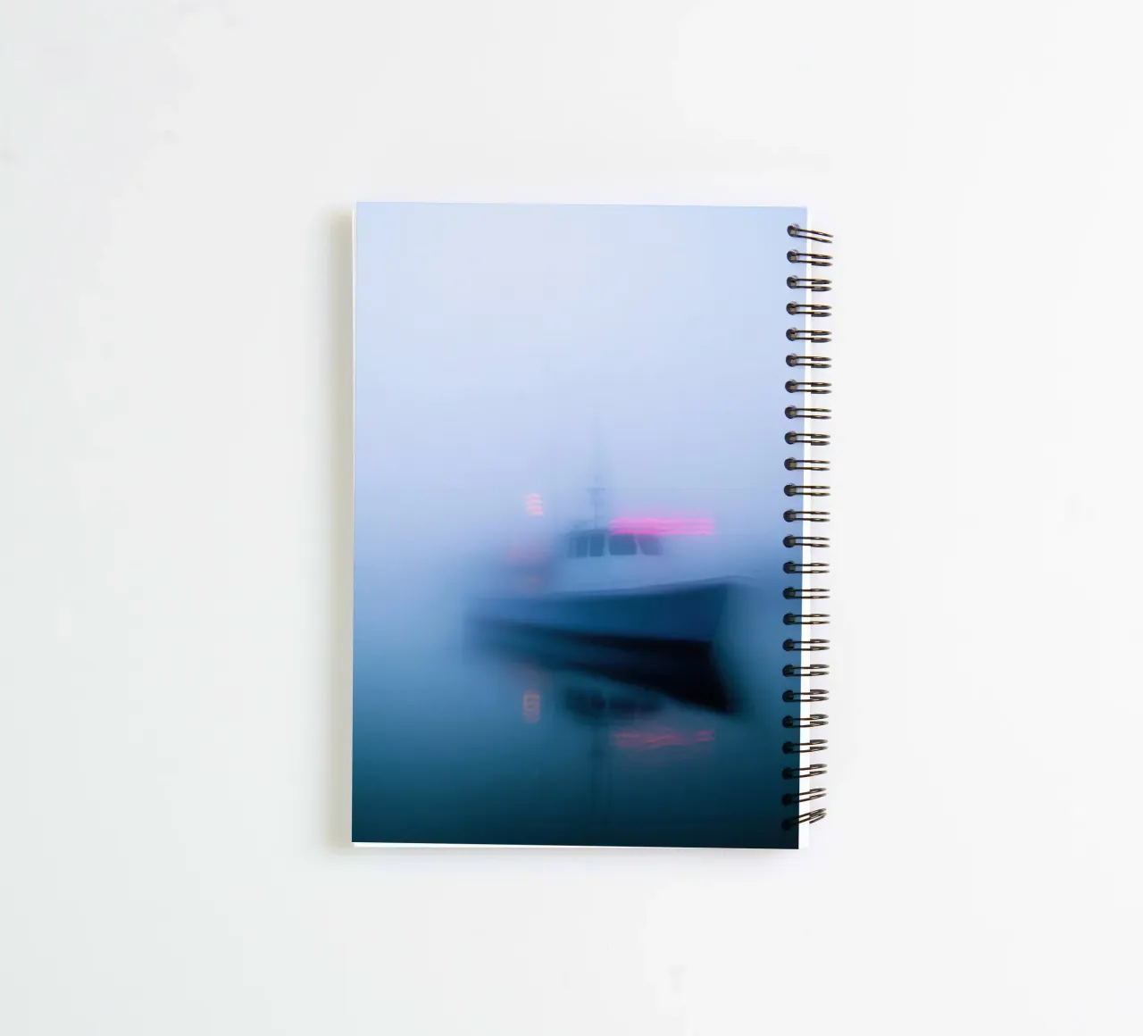 Mystical mist and a lonely boat spiral notebook by Le Flou