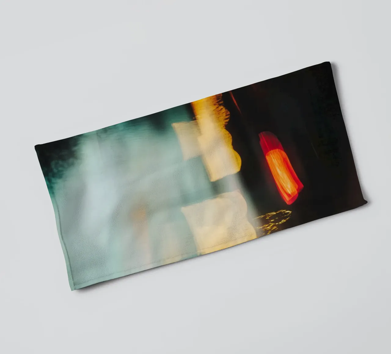 The fleeting lights of a busy street towel by Le Flou