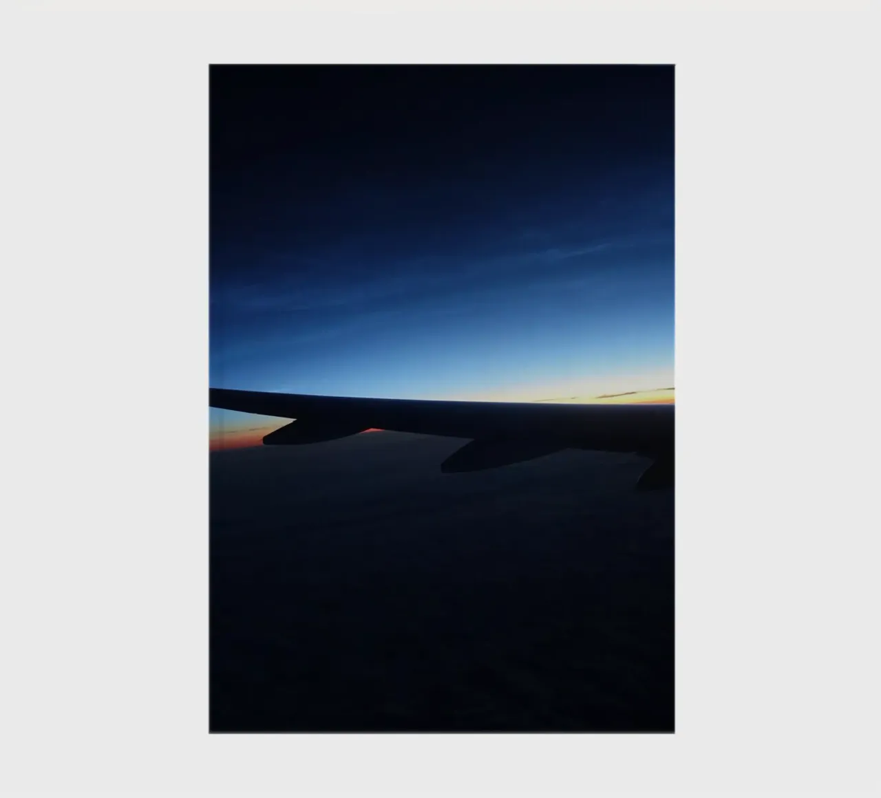 Sunset from a flight notebook by Massimo Frascogna