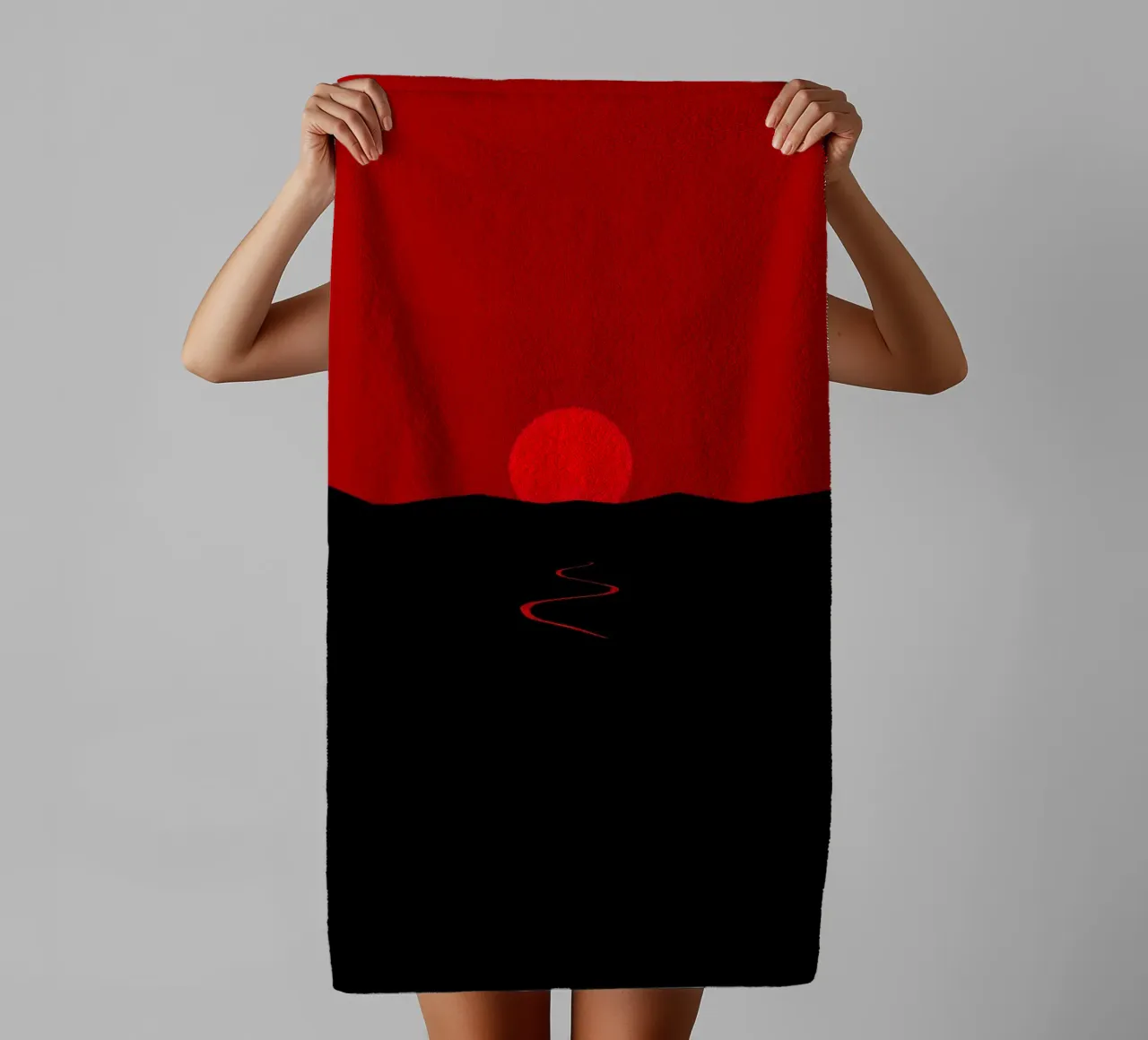 A vibrant sunset casts a red glow over a winding path towel by DesignDoodle