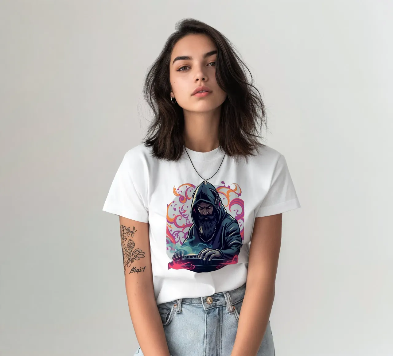 A DJ in a hoodie mixes tracks surrounded by colorful swirls t-shirt by DesignDoodle