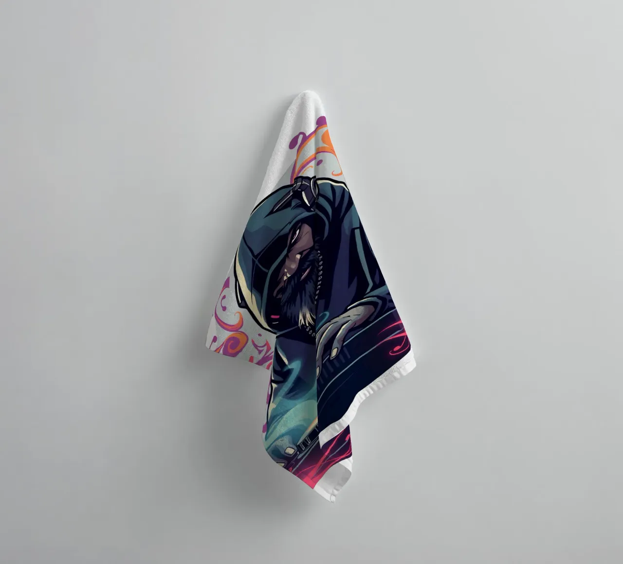 A DJ in a hoodie mixes tracks surrounded by colorful swirls towel by DesignDoodle