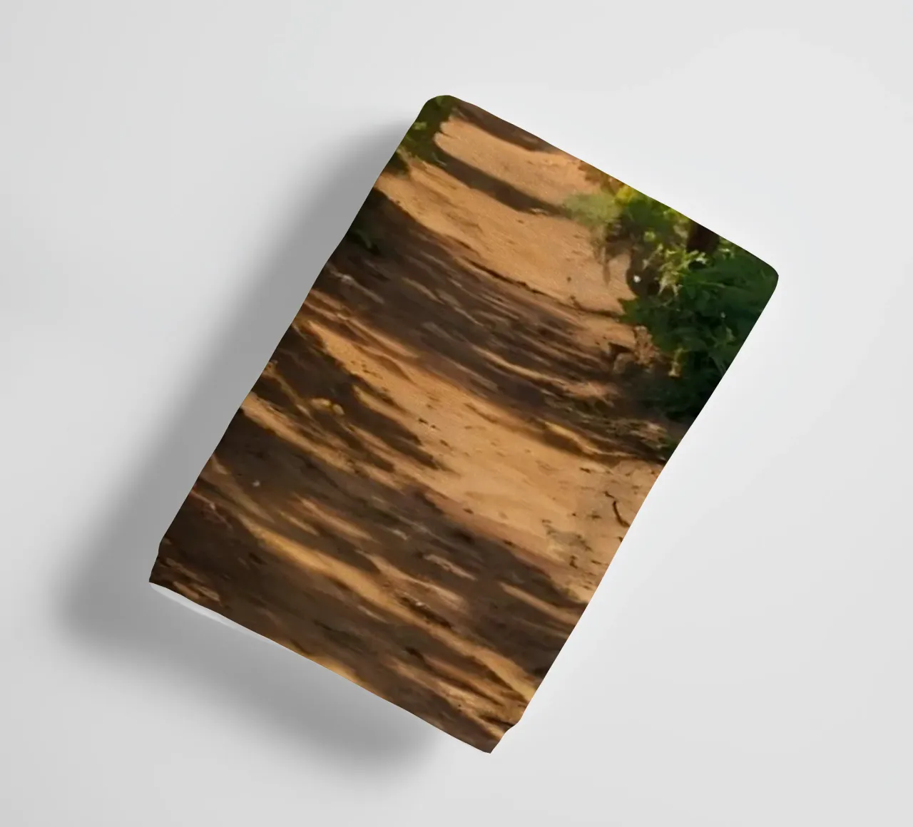 Sunny orange grove pathway surrounded by lush greenery towel by DesignDoodle
