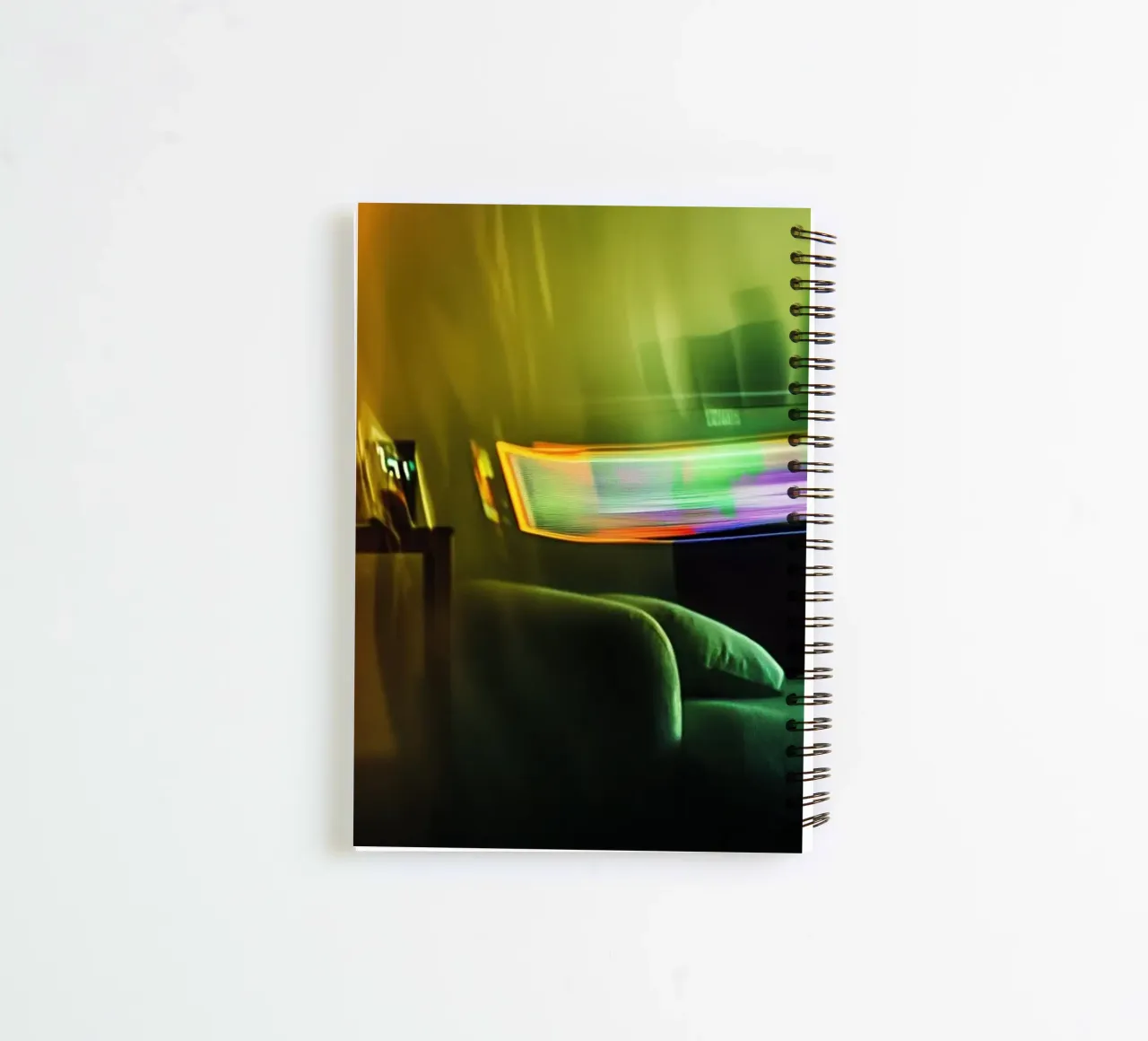 Abstract reflections in a golden atmosphere spiral notebook by Le Flou