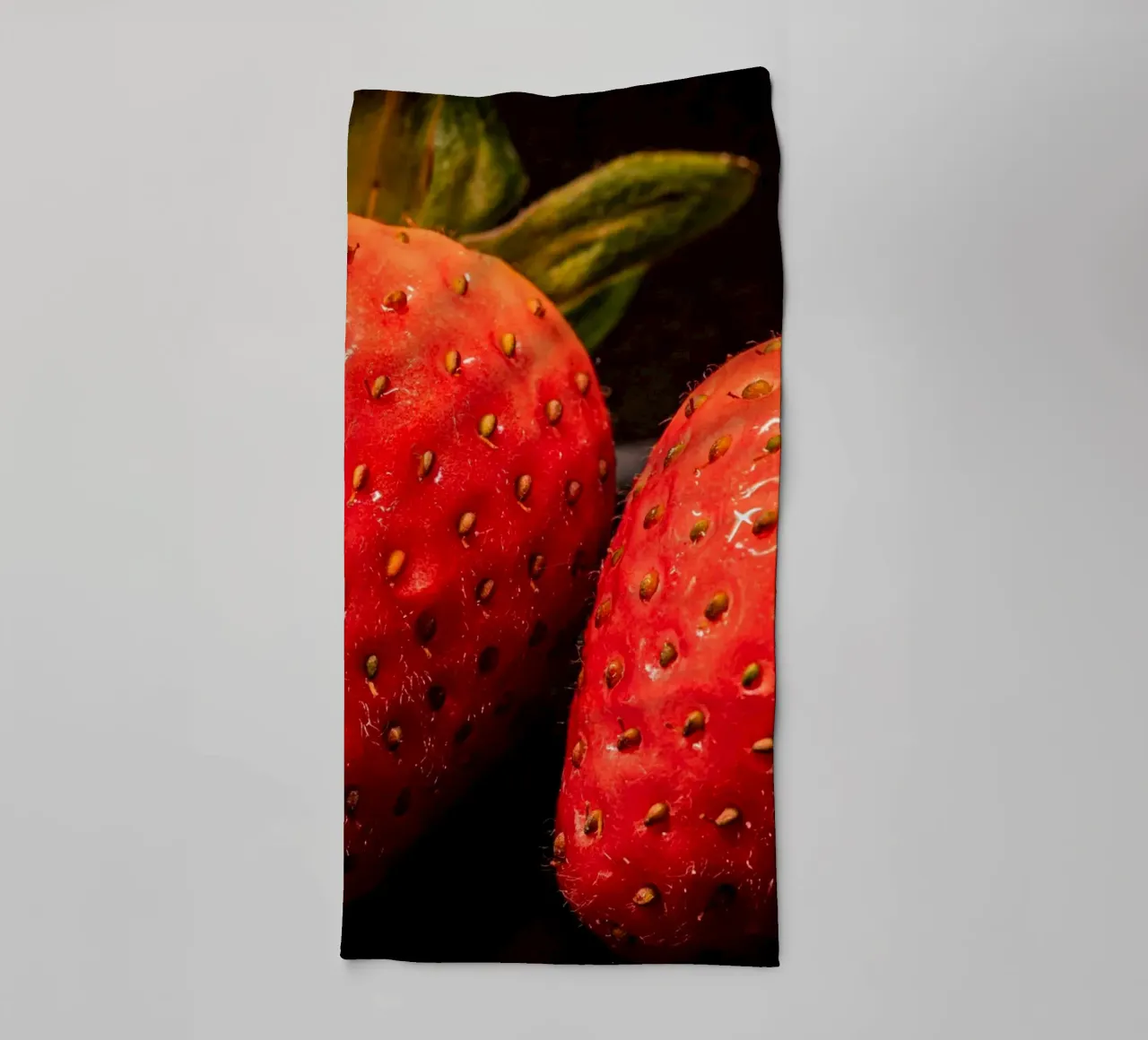 Strawberries against a black background towel by Marcus Beckert | Fotografie