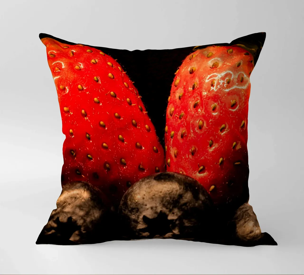 Strawberries and blueberries against a black background decorative cushion by Marcus Beckert | Fotografie