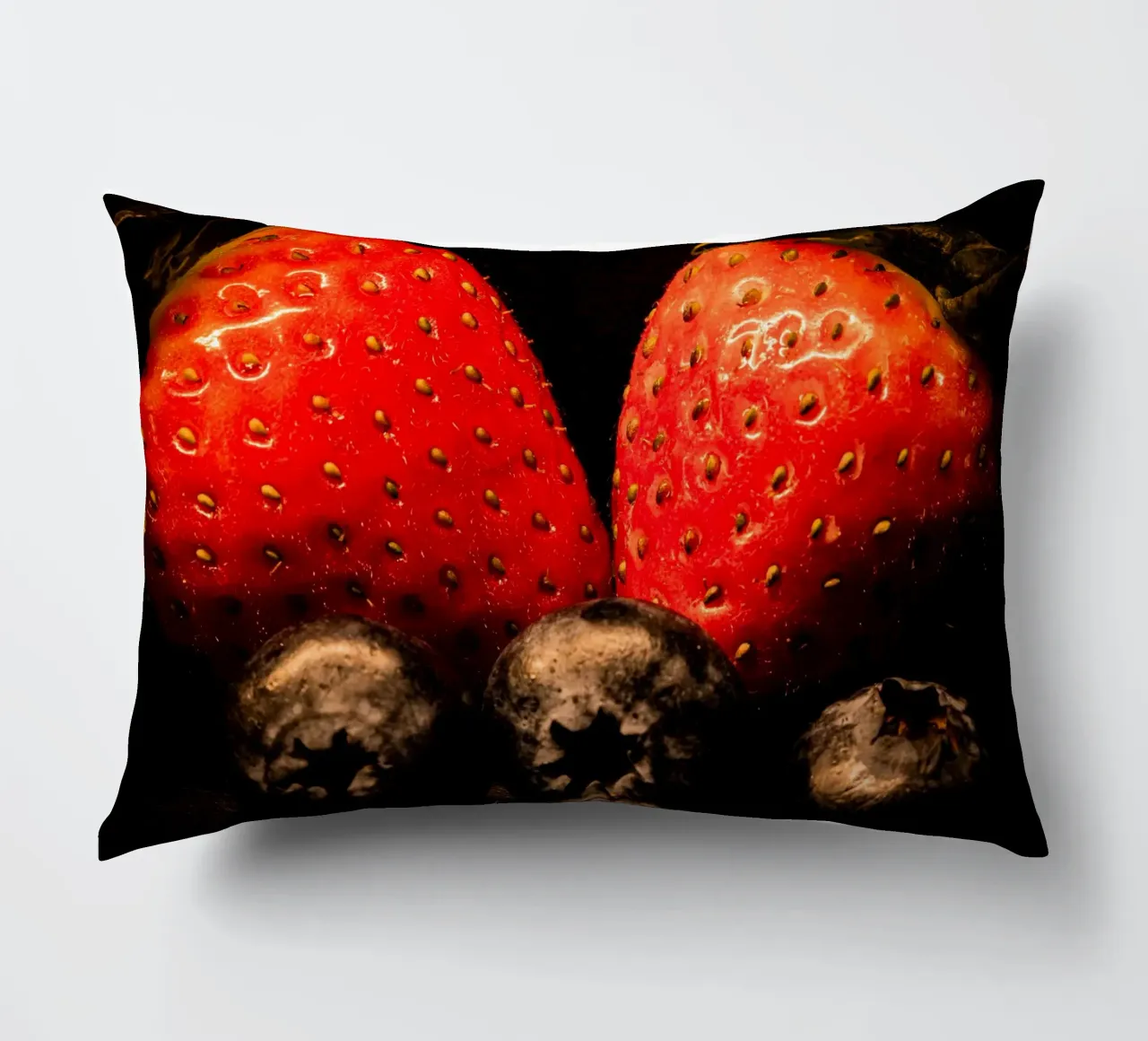 Strawberries and blueberries against a black background decorative cushion by Marcus Beckert | Fotografie