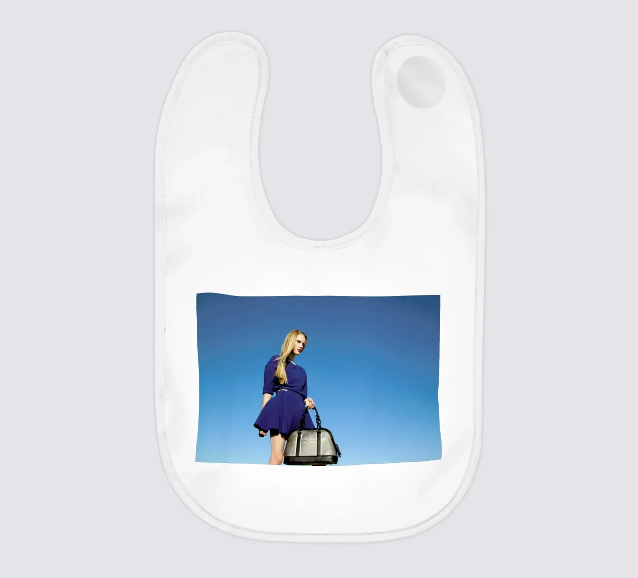 In the Blue baby bib by Aysha Banos
