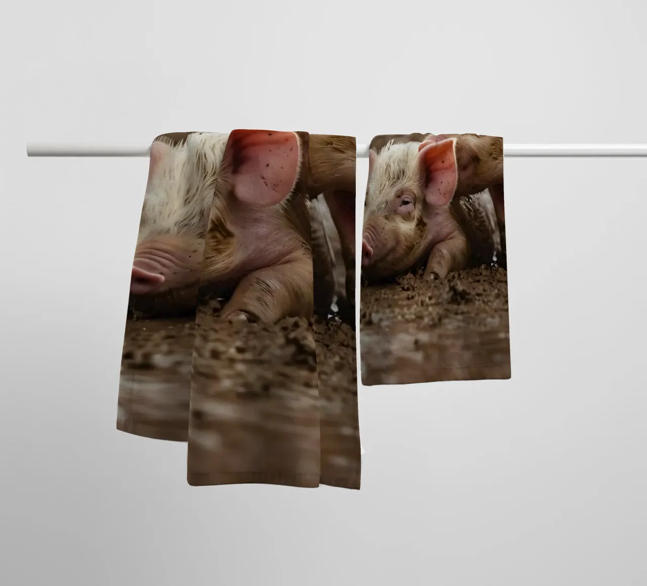 Two playful piglets enjoying muddy ground on a farm towel by DesignDoodle