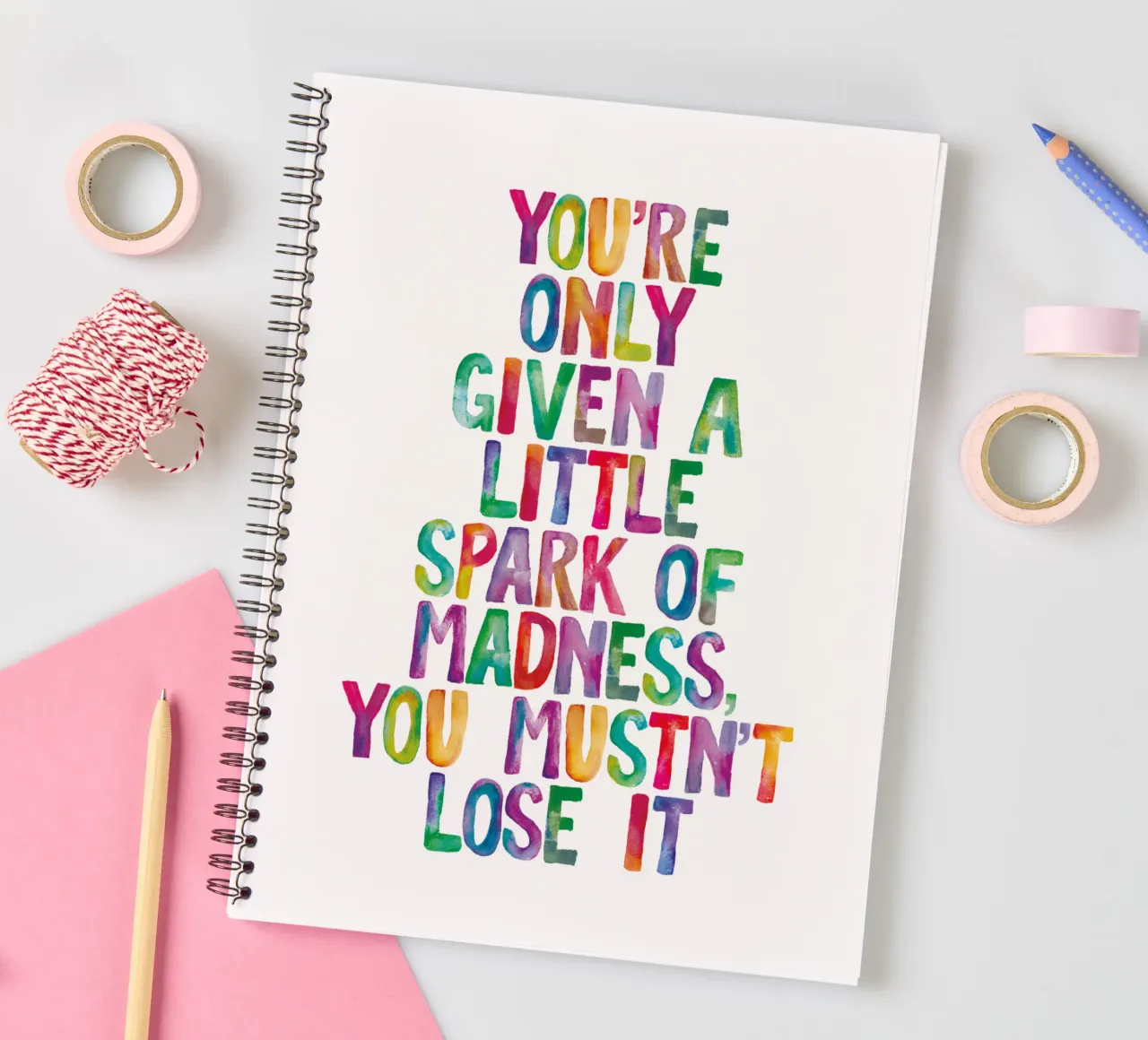You Are Only Given a Little Spark of Madness Rainbow Type spiral notebook by THE MOTIVATED TYPE