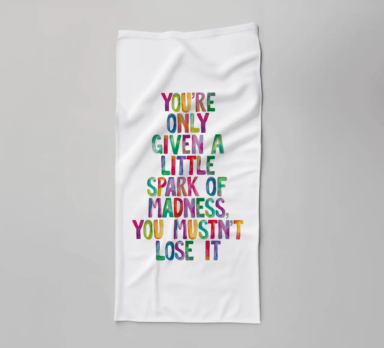 You Are Only Given a Little Spark of Madness Rainbow Type towel by THE MOTIVATED TYPE