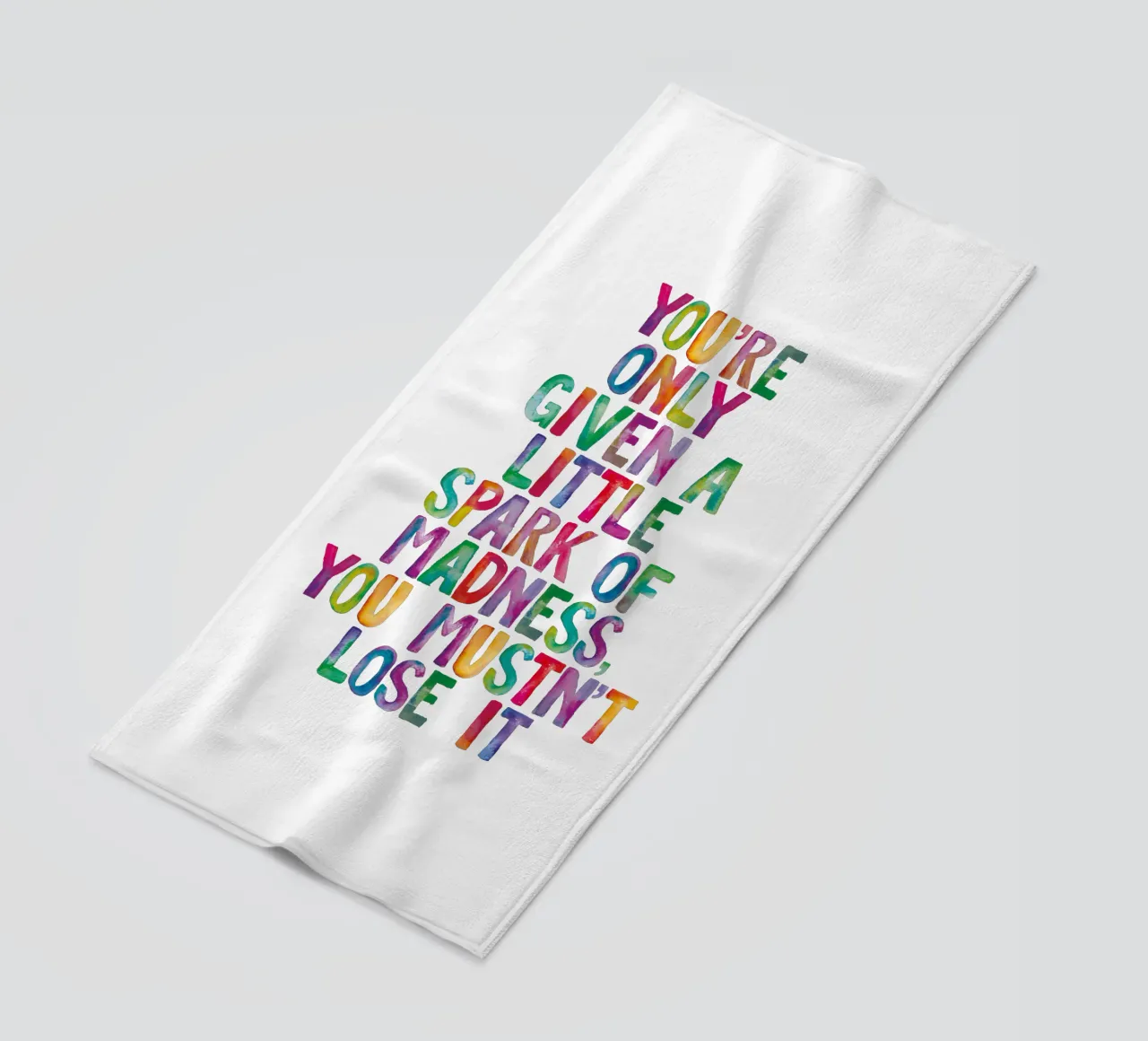 You Are Only Given a Little Spark of Madness Rainbow Type beach towel by THE MOTIVATED TYPE
