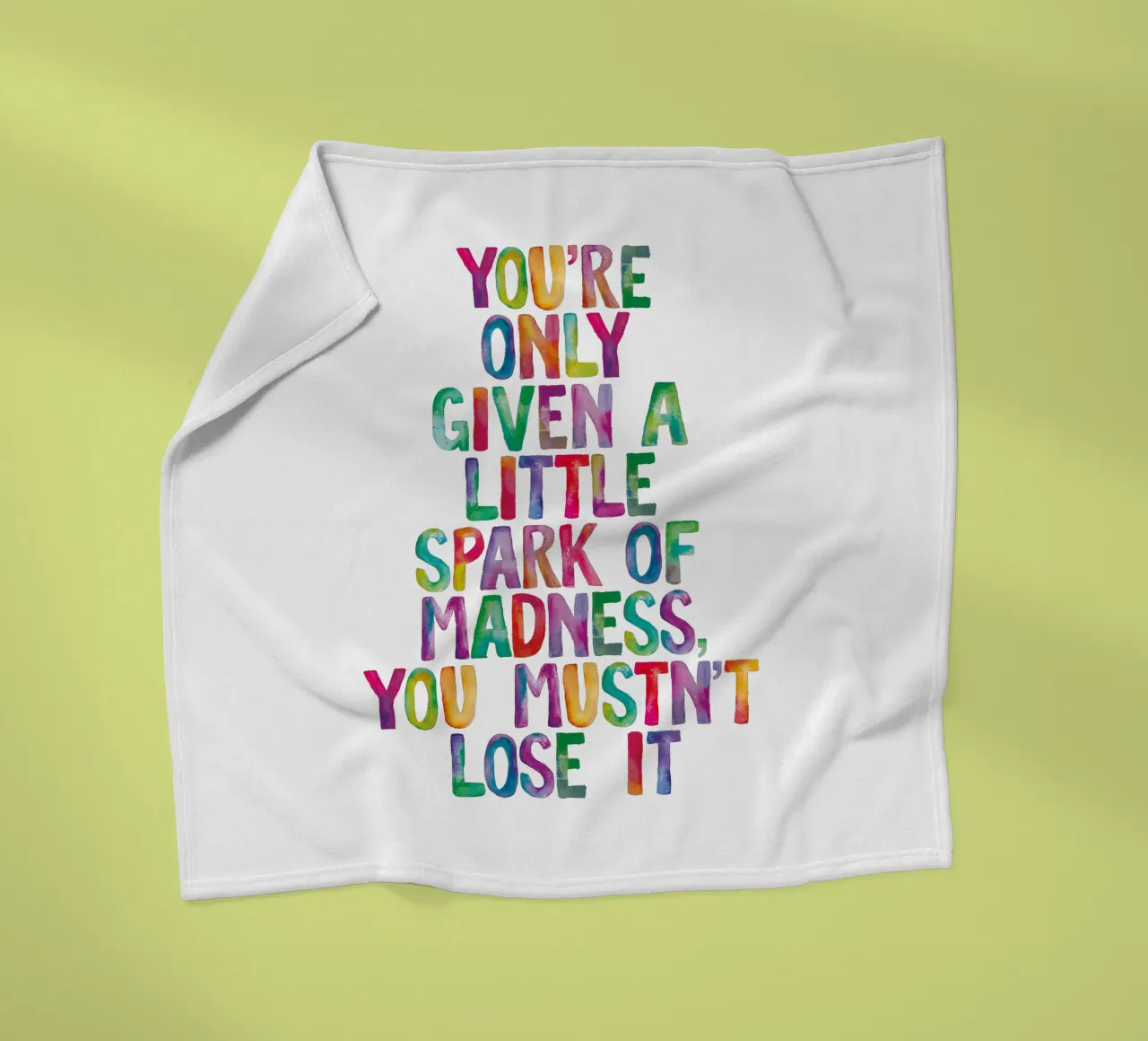 You Are Only Given a Little Spark of Madness Rainbow Type fleece blanket by THE MOTIVATED TYPE