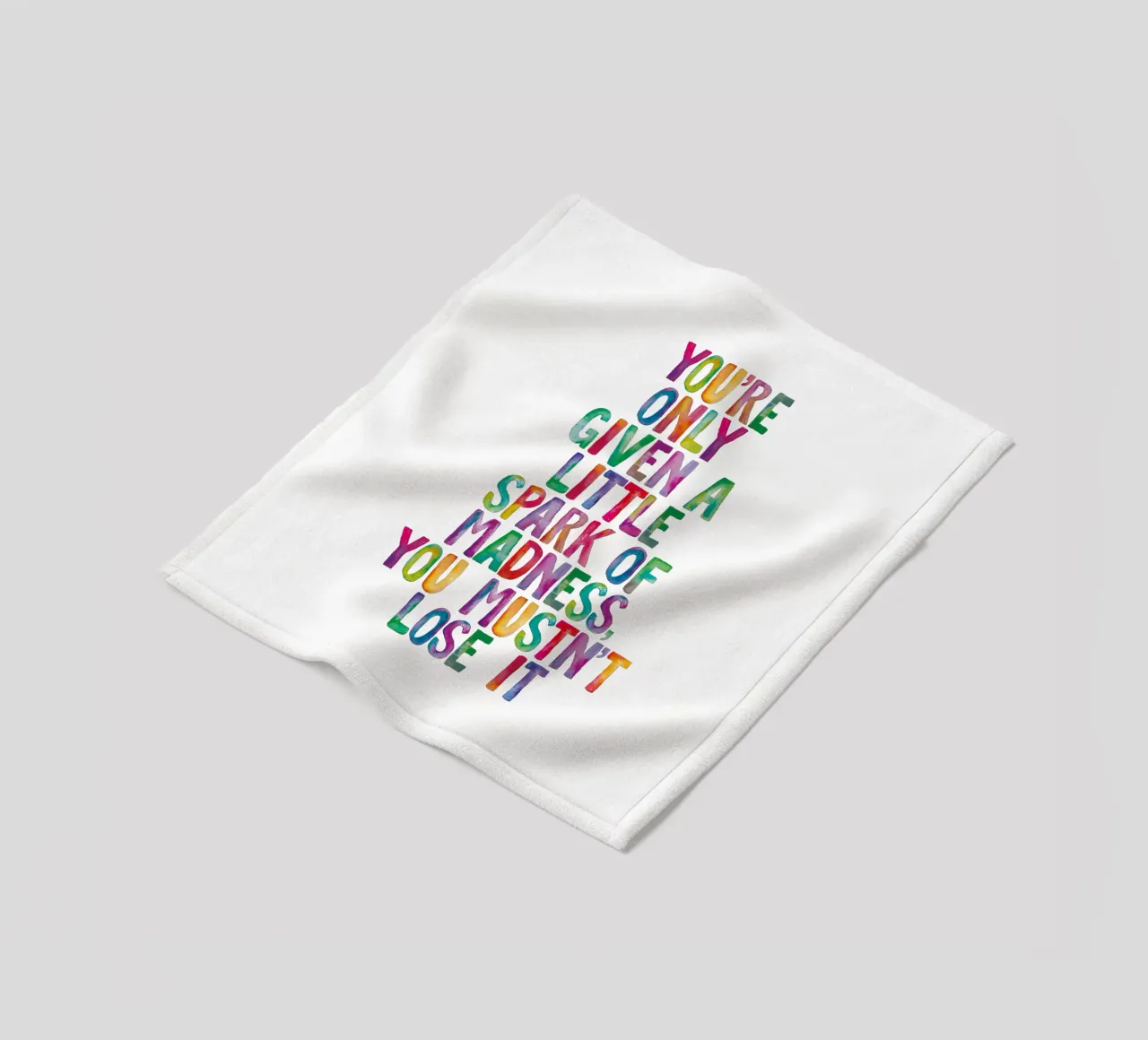 You Are Only Given a Little Spark of Madness Rainbow Type fleece blanket by THE MOTIVATED TYPE