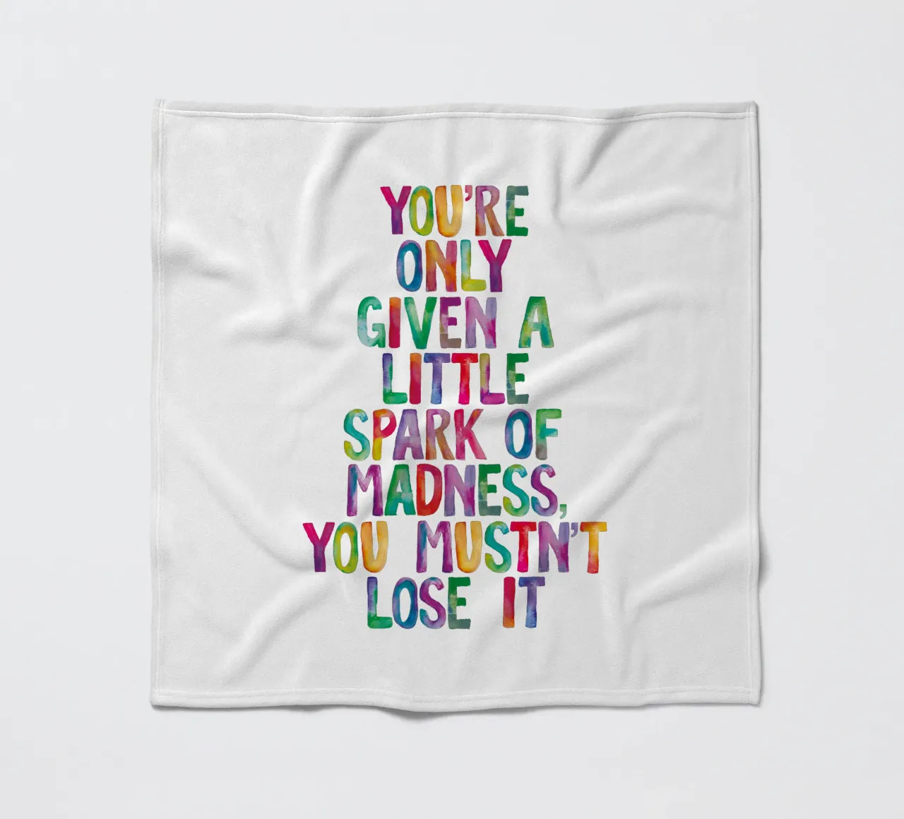 You Are Only Given a Little Spark of Madness Rainbow Type fleece blanket by THE MOTIVATED TYPE