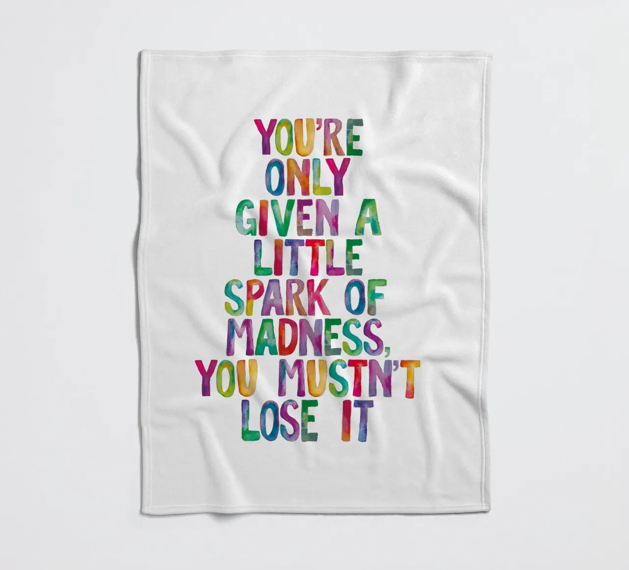You Are Only Given a Little Spark of Madness Rainbow Type fleece blanket by THE MOTIVATED TYPE