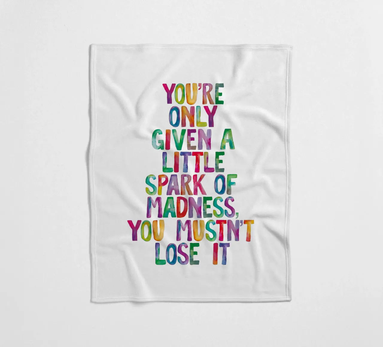 You Are Only Given a Little Spark of Madness Rainbow Type fleece blanket by THE MOTIVATED TYPE