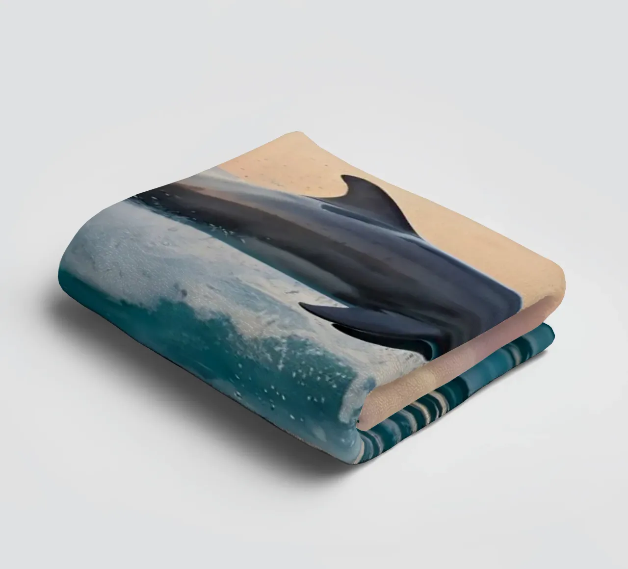 Dolfijn springt sierlijk boven het oceaanoppervlak zonsondergang badhanddoek van DesignDoodle