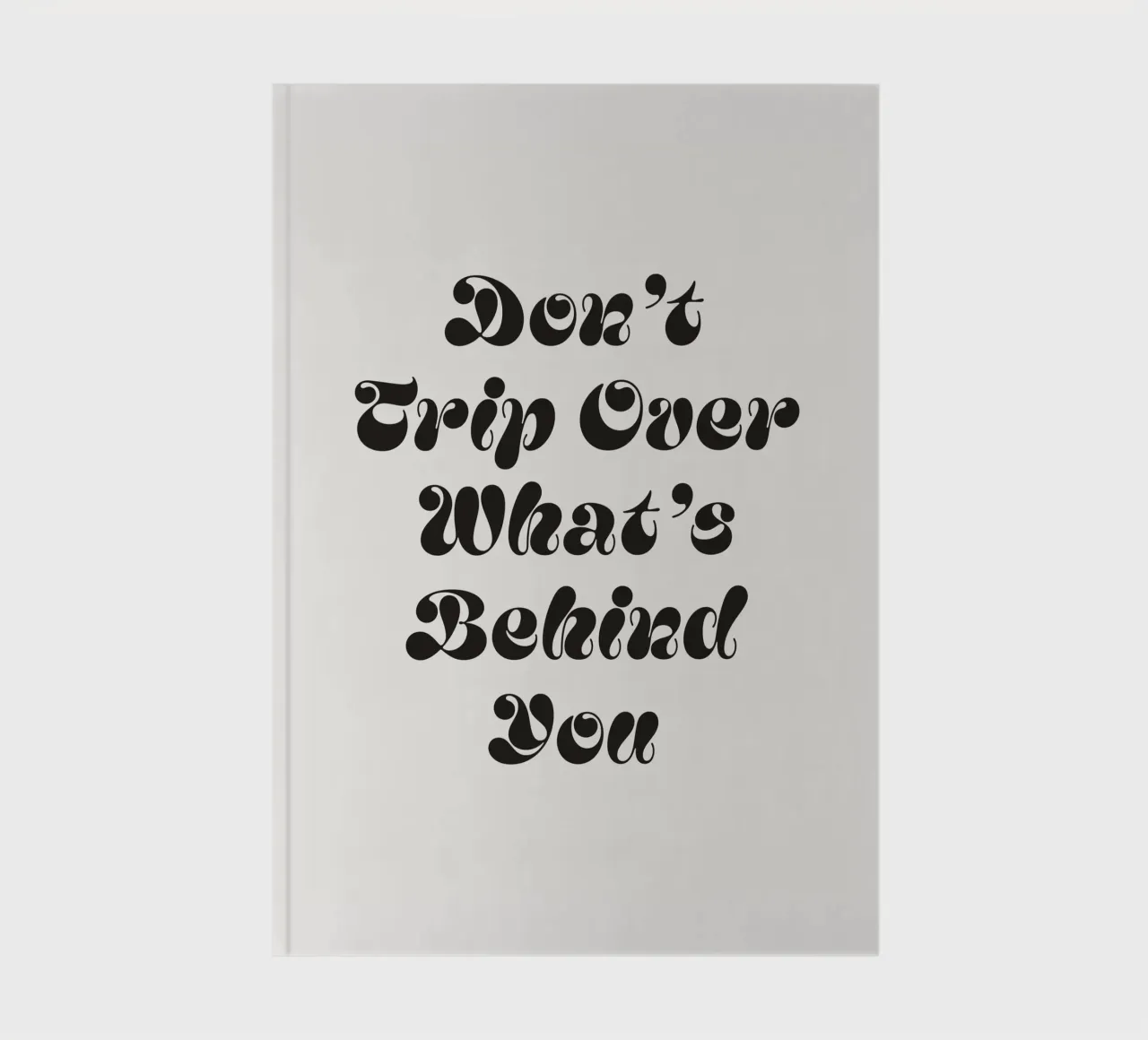 Don't trip over what's behind you quote notebook by Paigaam Studio