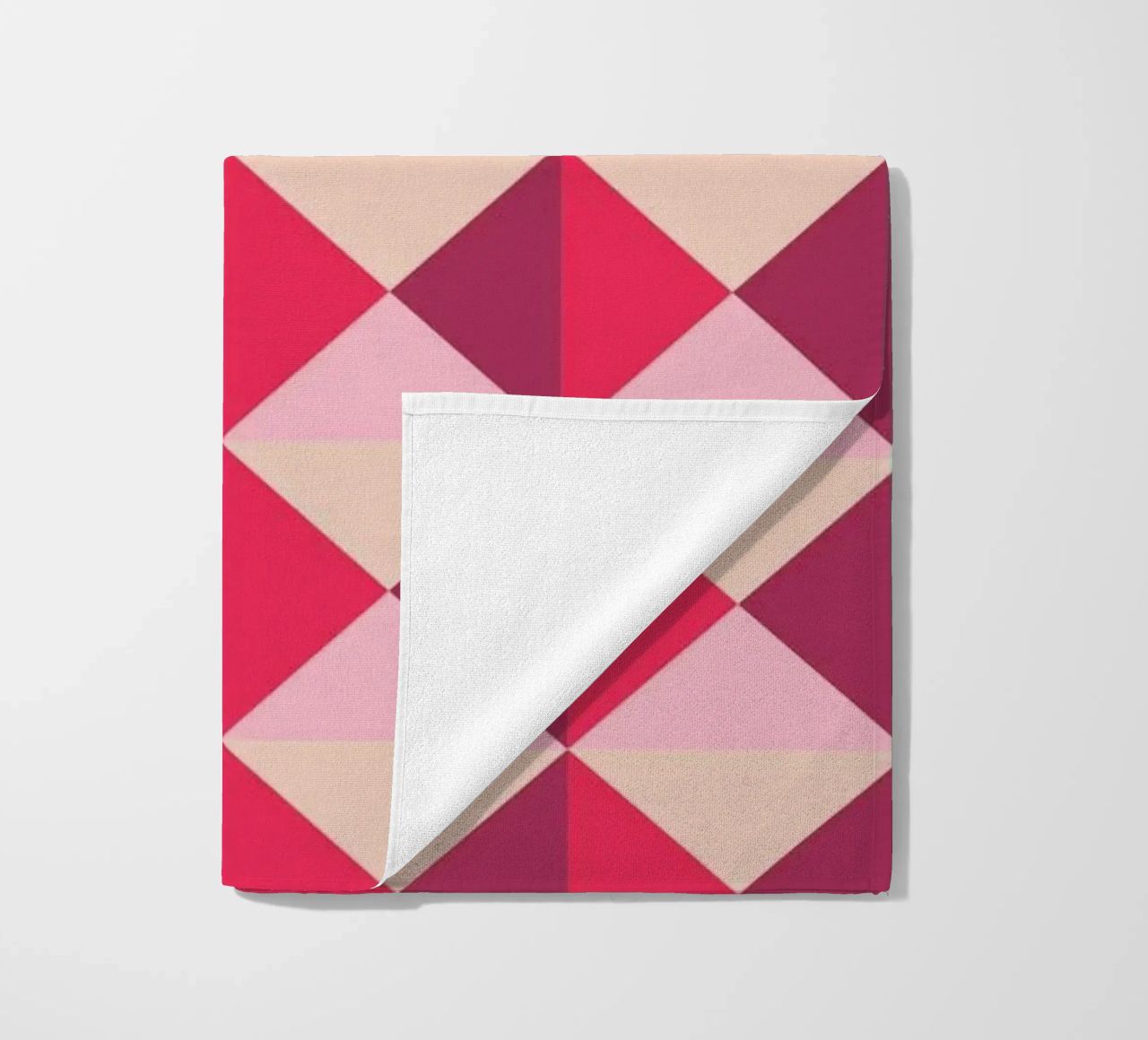 Colourful playful pattern, small squares and triangles beach towel by CreatedbySon