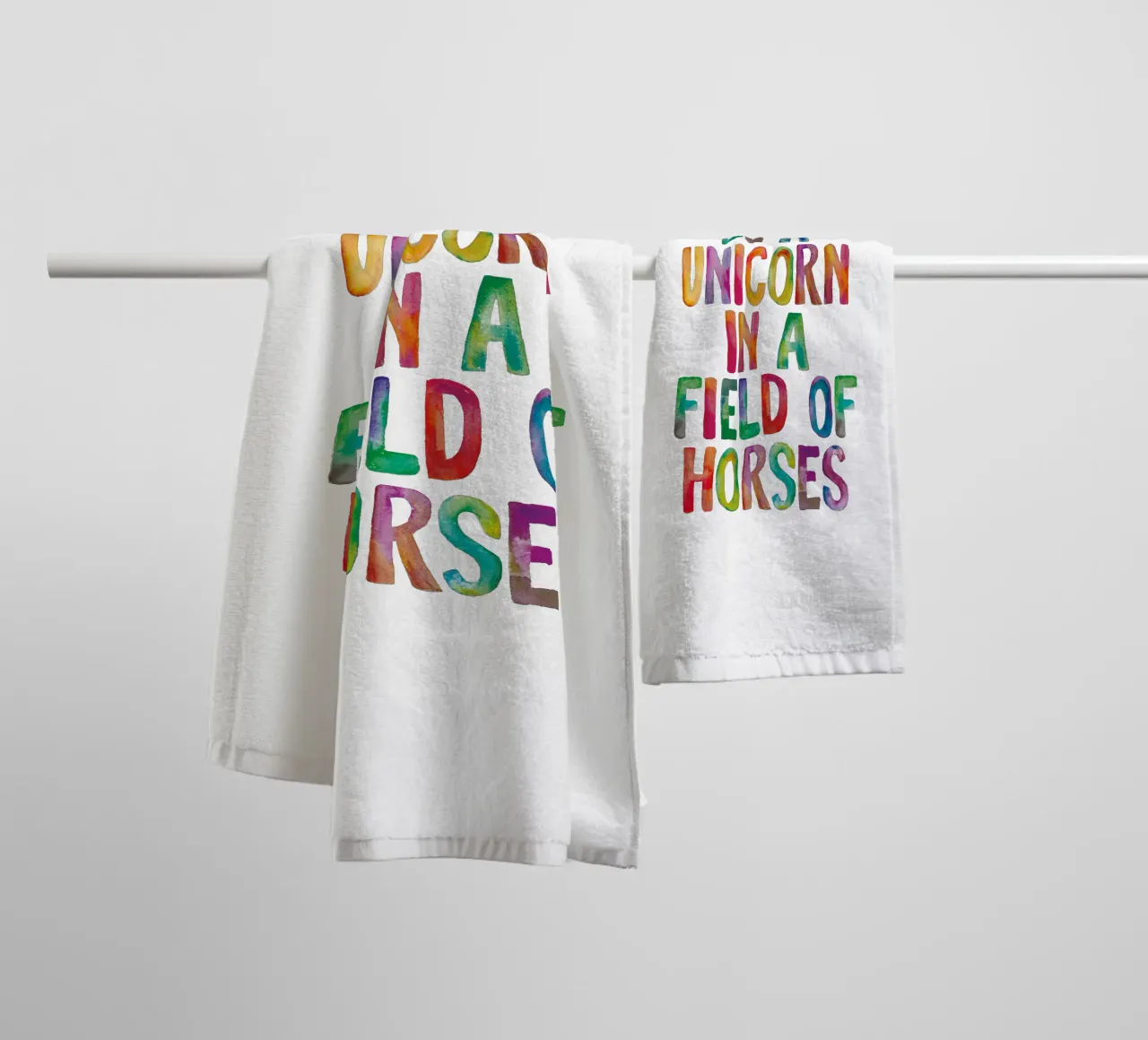 Be a Unicorn in a Field of Horses Rainbow Typography Design towel by THE MOTIVATED TYPE