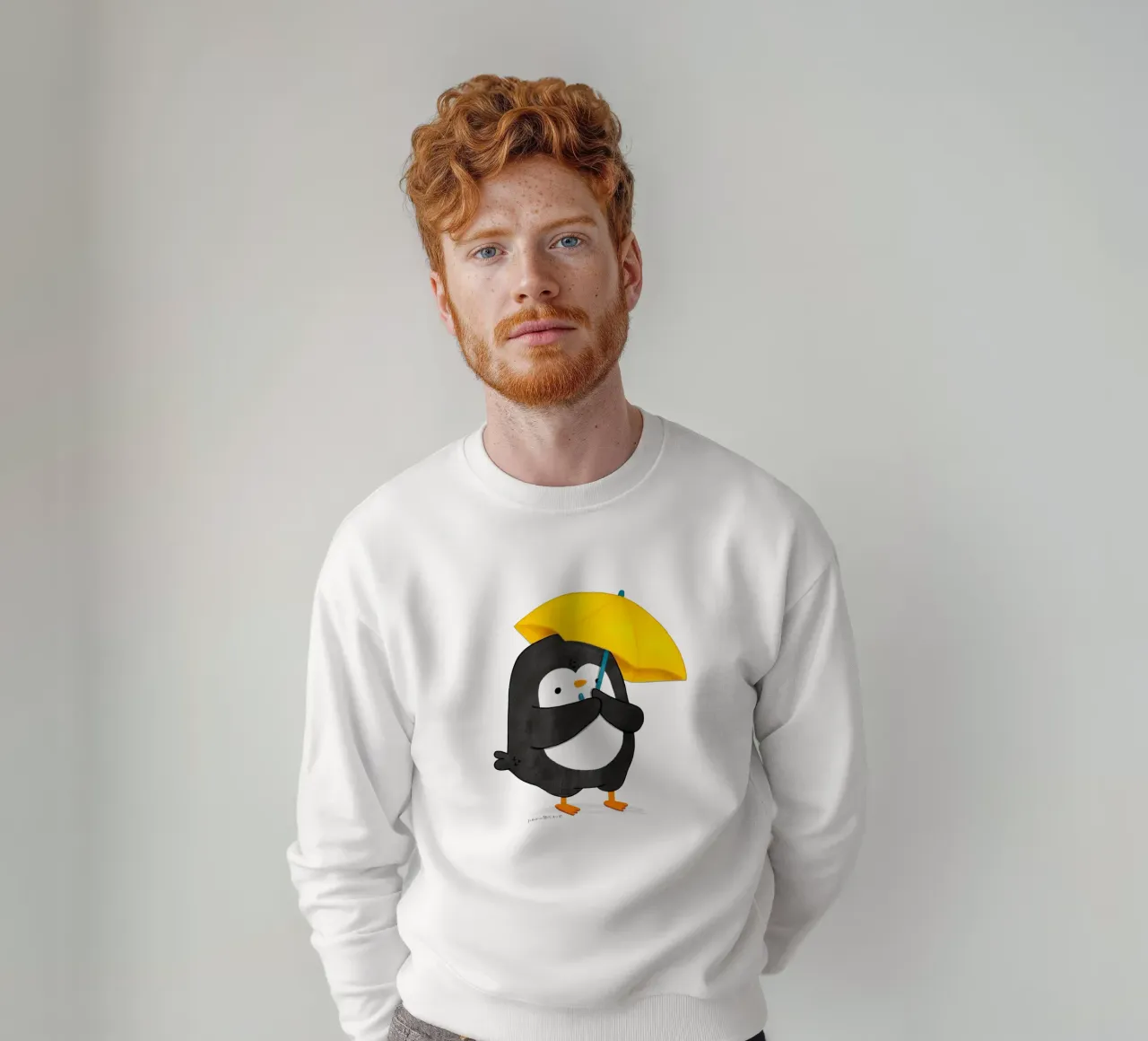 Pingouin avec un parapluie jaune sweat de julianamotzko