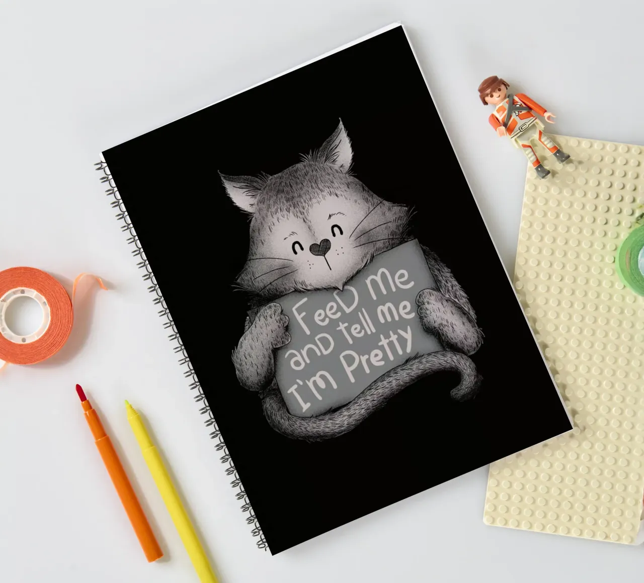 Feed Me and Tell Me I'm Pretty spiral notebook by Tobe Fonseca