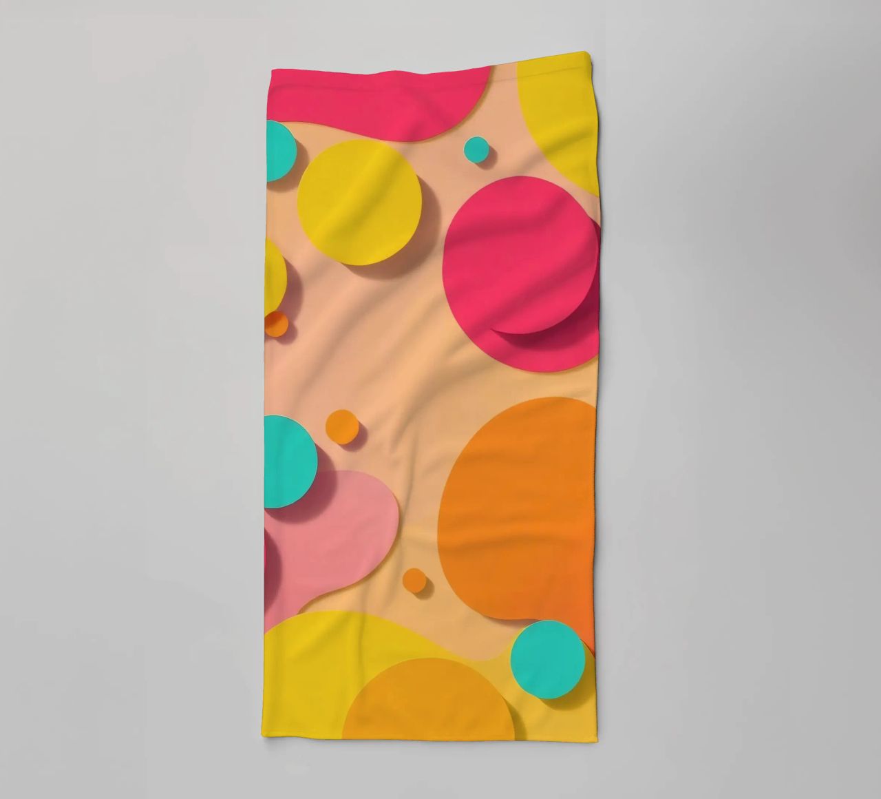 Brightly colored abstract shapes create a vibrant playful towel by DesignDoodle