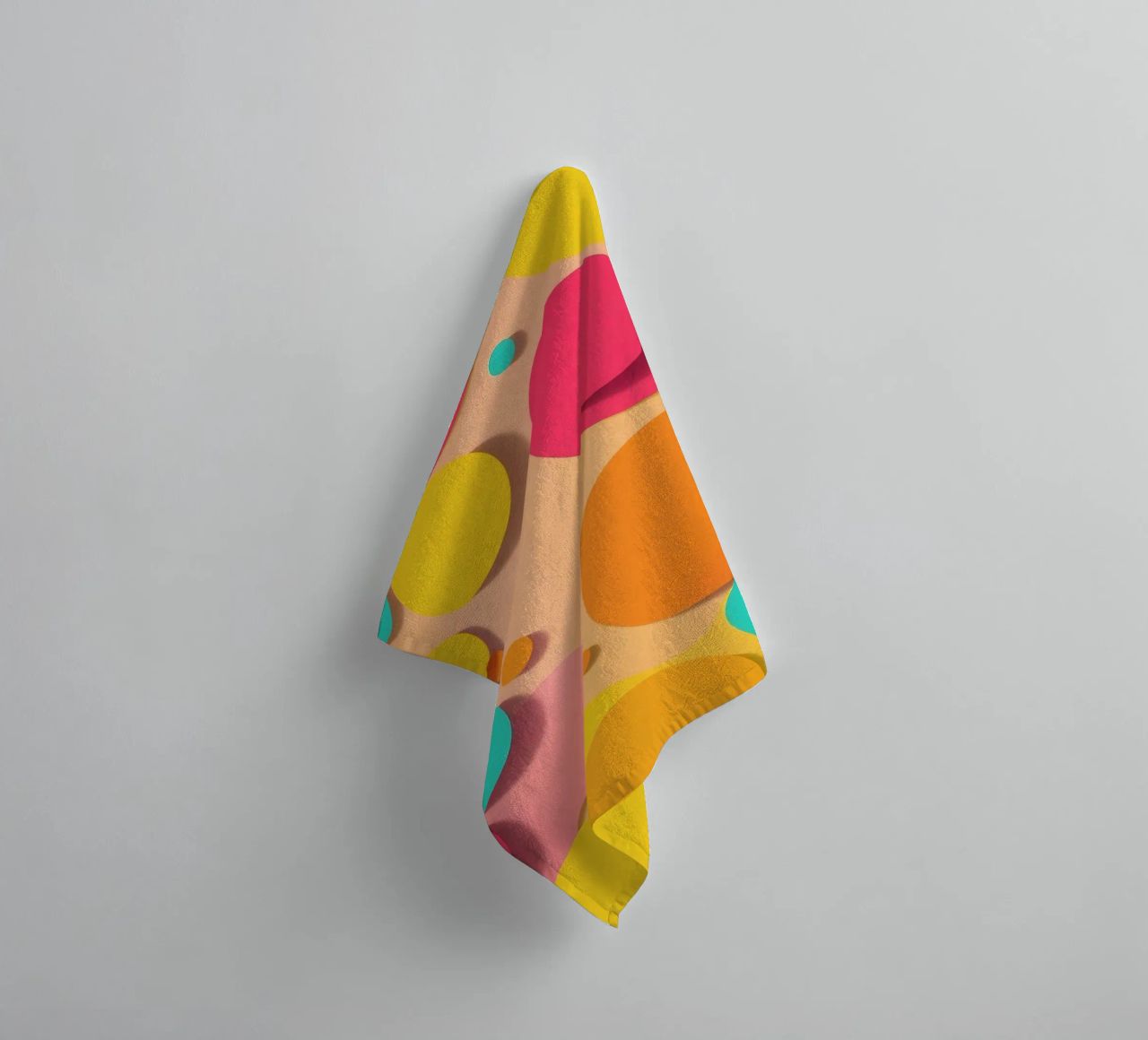 Brightly colored abstract shapes create a vibrant playful towel by DesignDoodle