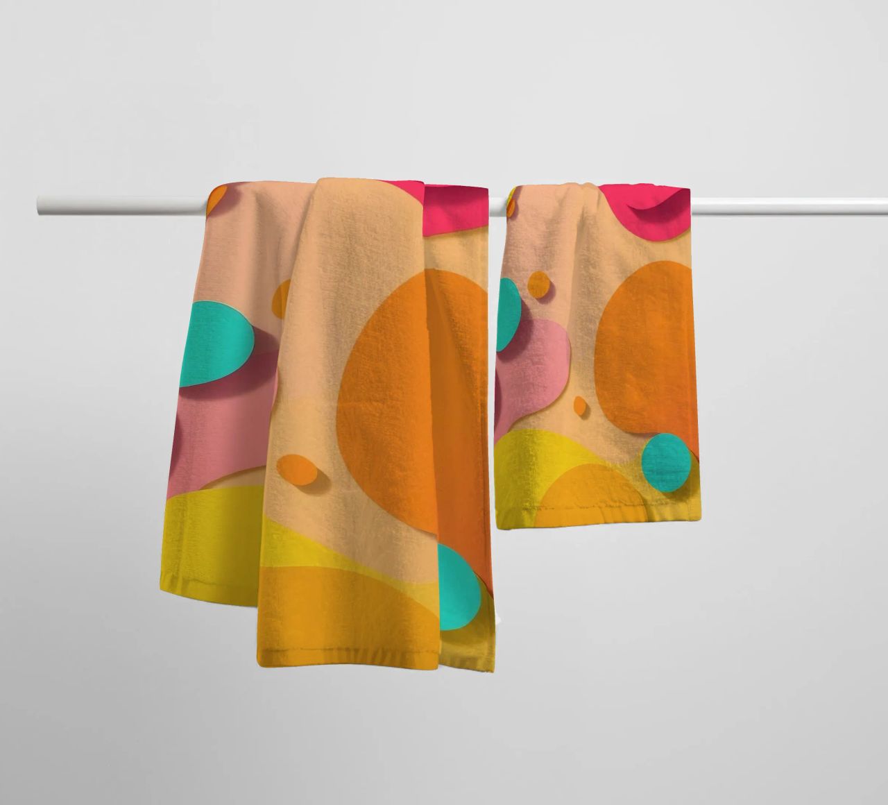 Brightly colored abstract shapes create a vibrant playful towel by DesignDoodle