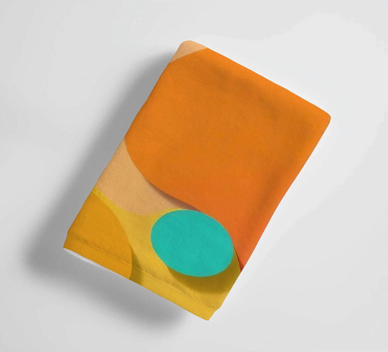 Brightly colored abstract shapes create a vibrant playful towel by DesignDoodle