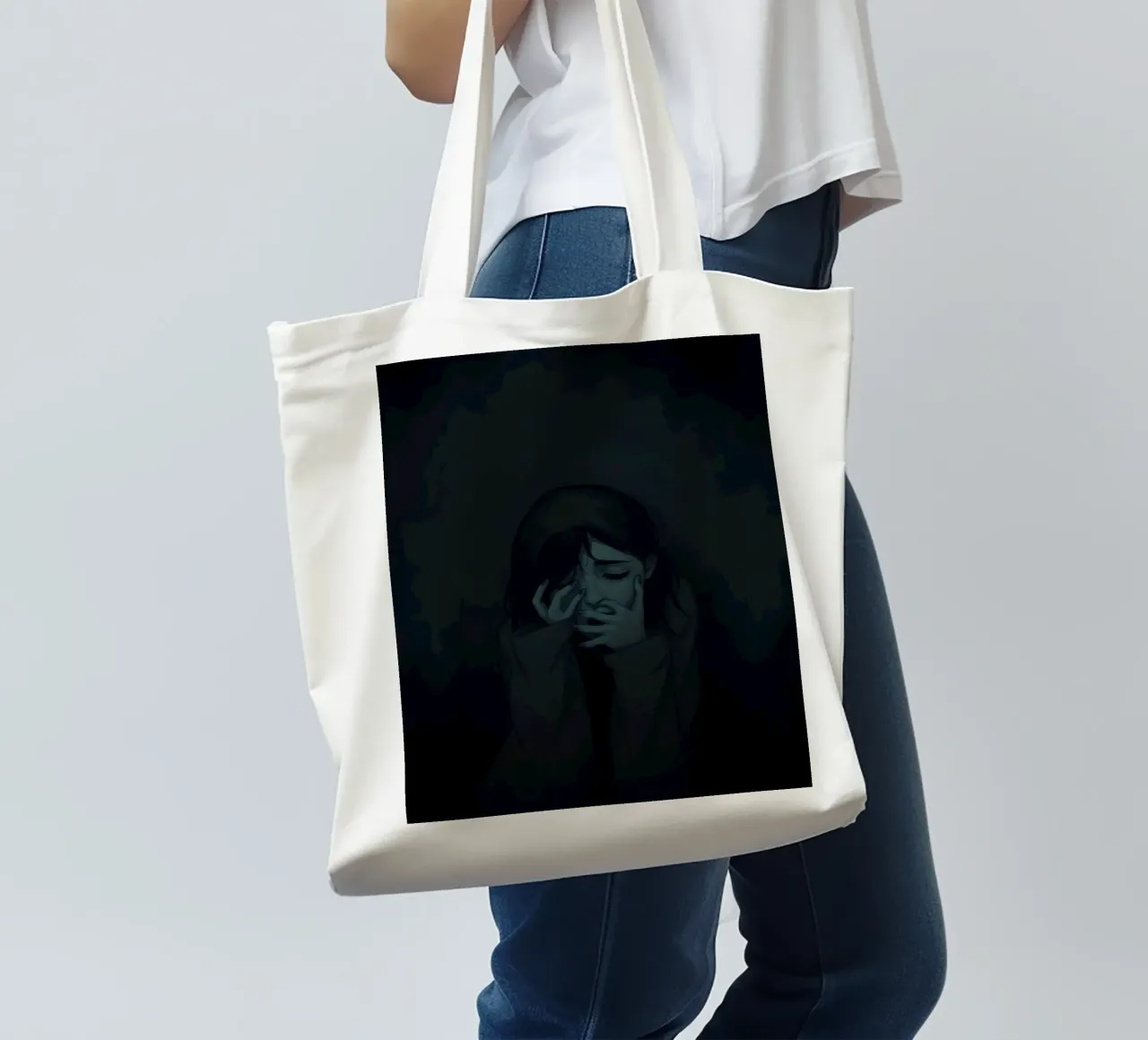 Emotional depiction of a young woman expressing deep sorrow tote bag by DesignDoodle